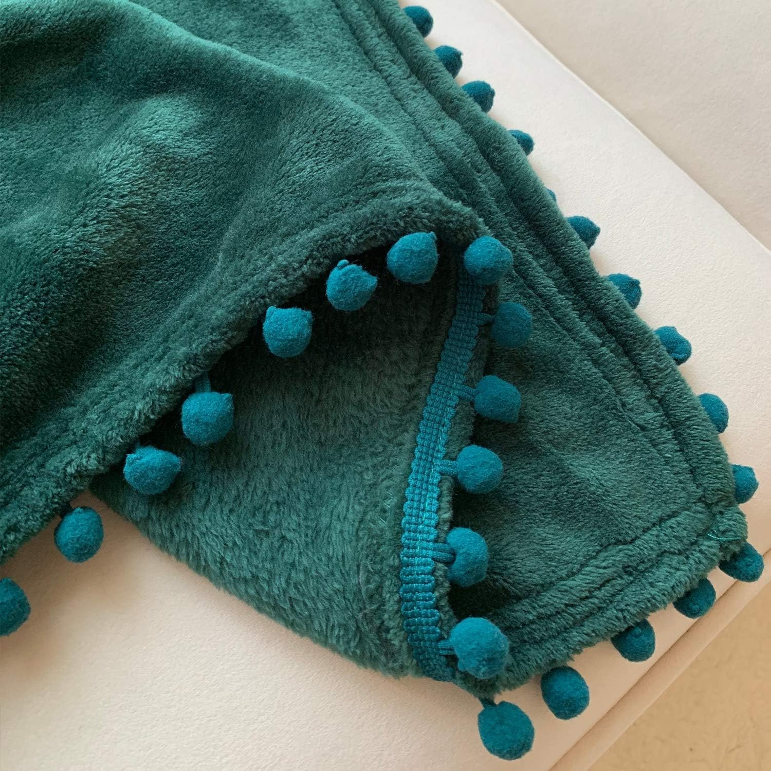 1729539525 636 LOMAO Lightweight Flannel Blanket with Pompom Fringe – Cozy Soft
